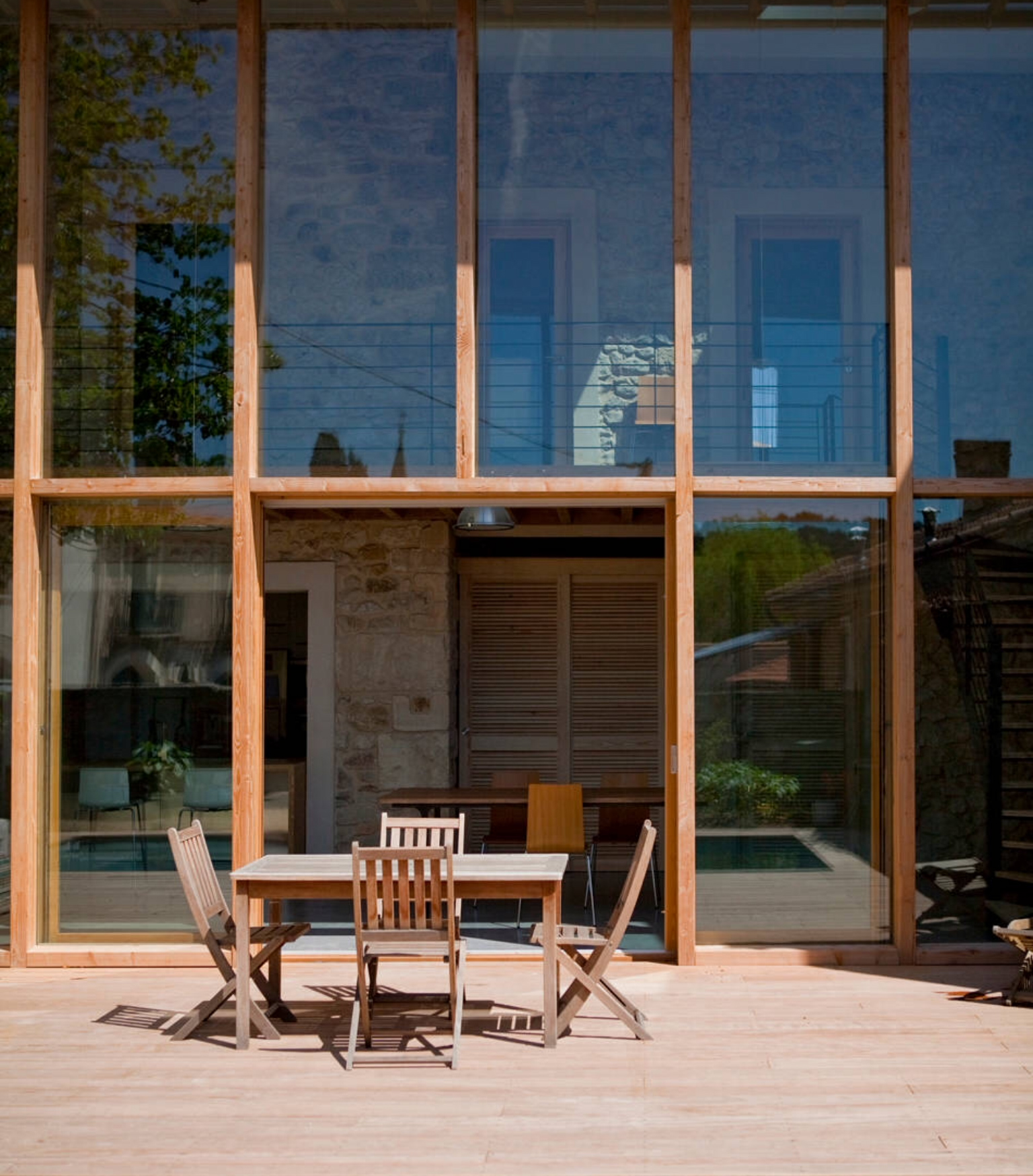 Aggrandissement de maison avec double vitrage sur structure bois